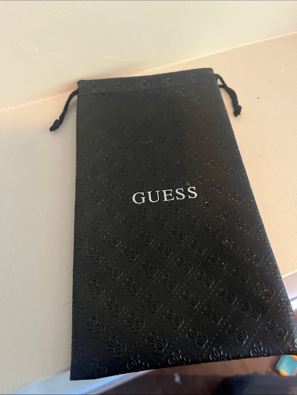 GUESS Black Embossed Drawstring Pouch for glasses